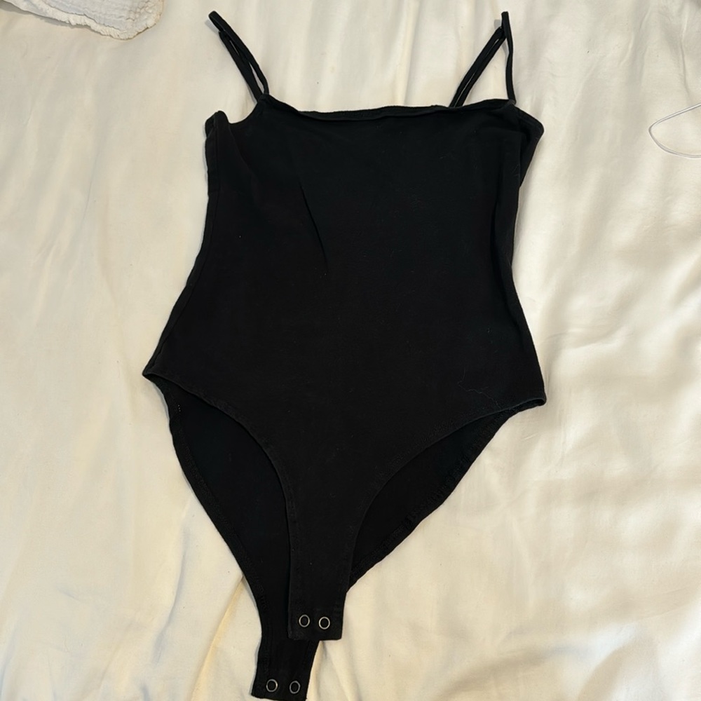 Black straight cotton body suit.